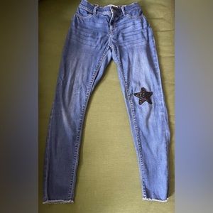 Rockstar jeggings with sequined star patch, adjustable waist